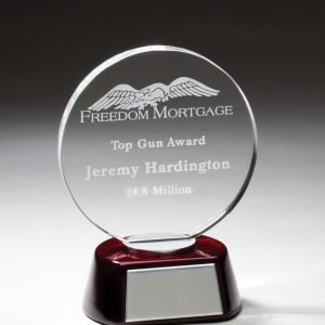 Round crystal award on rosewood base