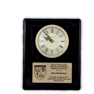 10.5'' x 13'' black piano finished clock with gold dial and three-hand movement